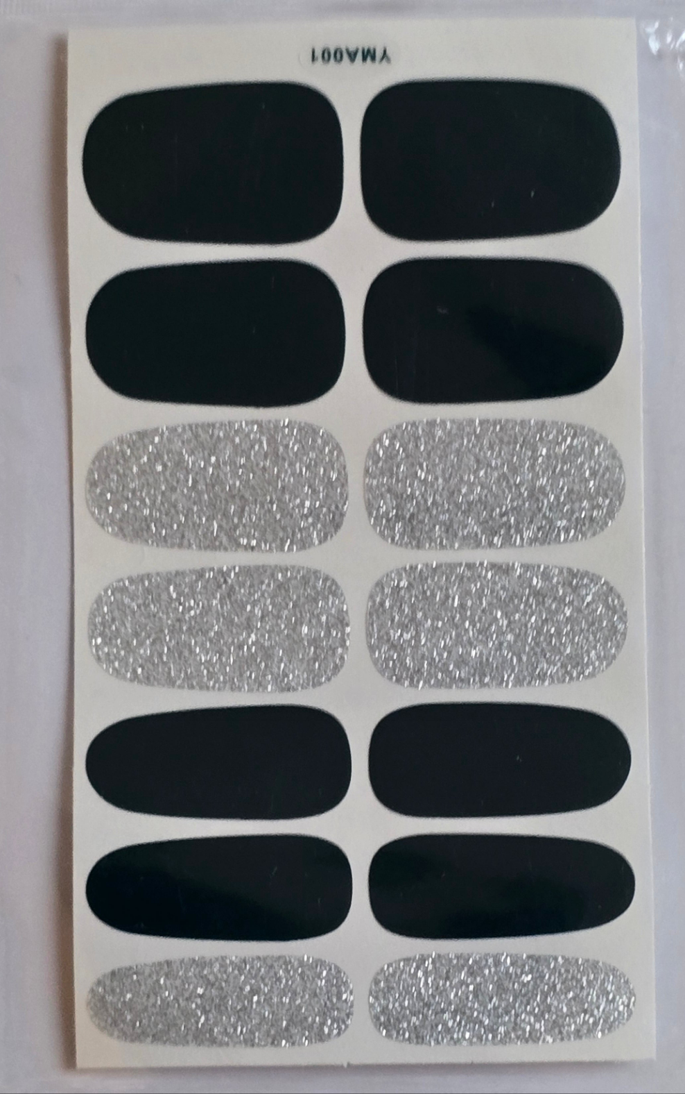 Midnight Shine: Bold Black & Silver Nail Art