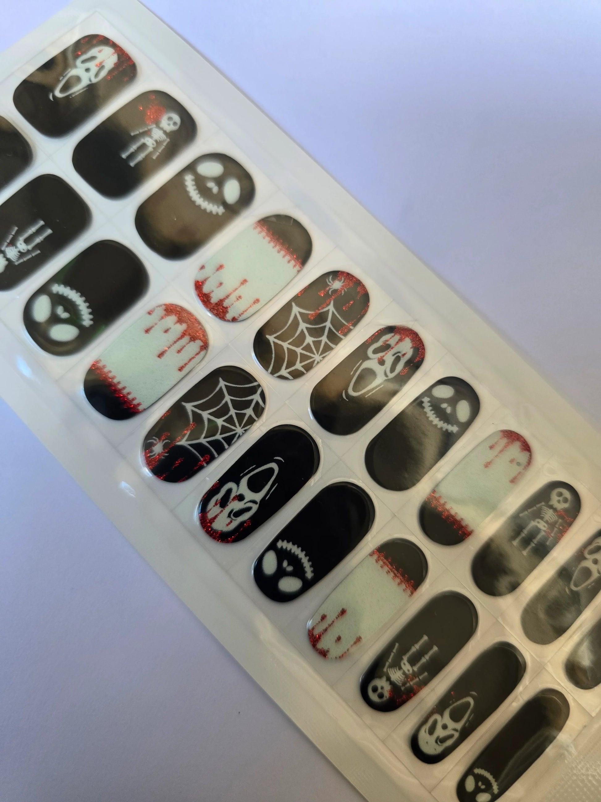 Spooky Black and White Halloween Nail Stickers: Perfect for a Frightfully Fun Manicure! www.swipeongel.com
