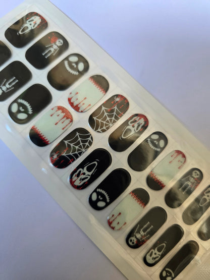 Spooky Black and White Halloween Nail Stickers: Perfect for a Frightfully Fun Manicure! www.swipeongel.com