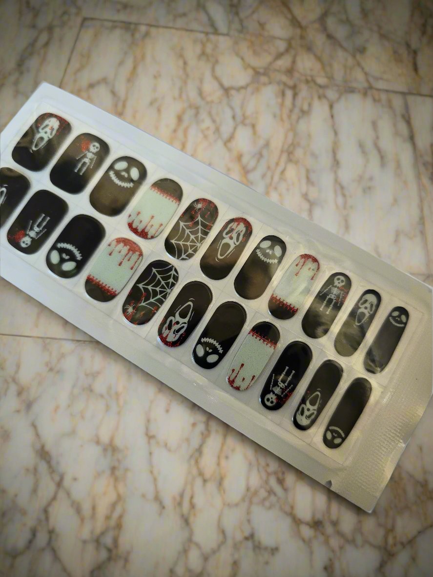 Spooky Black and White Halloween Nail Stickers: Perfect for a Frightfully Fun Manicure! www.swipeongel.com